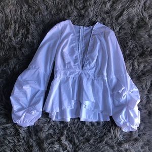 Deep V-neck puff sleeve blouse